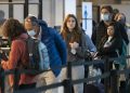 Should you wear a mask on a plane, bus or train when there’s no mandate? 4 essential reads to help you decide