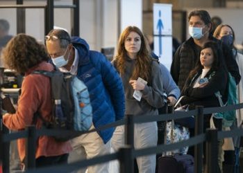 Should you wear a mask on a plane, bus or train when there’s no mandate? 4 essential reads to help you decide