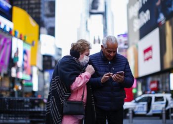 New Yorkers advised to wear masks indoors as city’s COVID alert level raised to high
