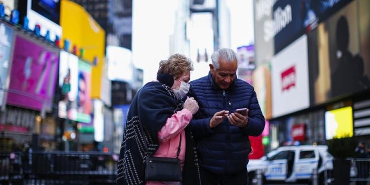 New Yorkers advised to wear masks indoors as city’s COVID alert level raised to high