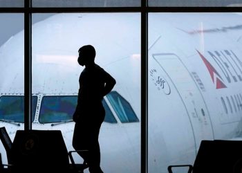 Biden officials ending international travel COVID testing requirement