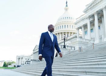 Warnock pushes for Medicaid expansion amid tough reelection battle