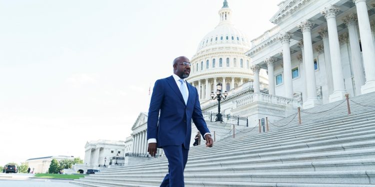 Warnock pushes for Medicaid expansion amid tough reelection battle