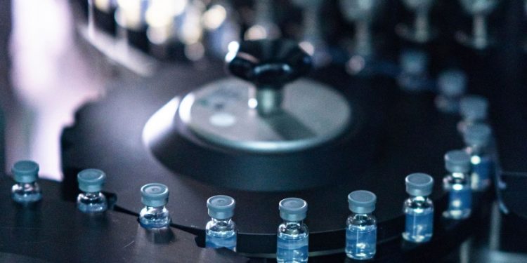 Pfizer looks to charge at least $110 a dose for COVID-19 vaccine next year