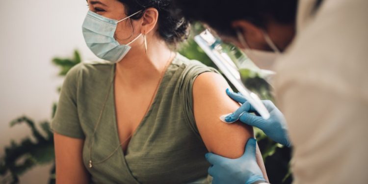 CDC advisers recommend adding COVID-19 shots to regular immunization schedule