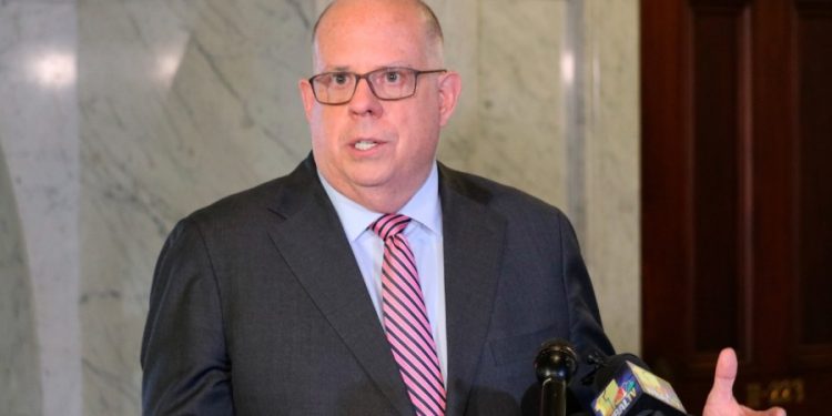 Hogan tests positive for COVID