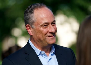 Emhoff visits 988 call center to highlight mental health during the holidays