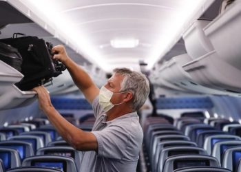 WHO officials recommend mask-wearing for travel in light of XBB.1.5, stop short of endorsing travel checks