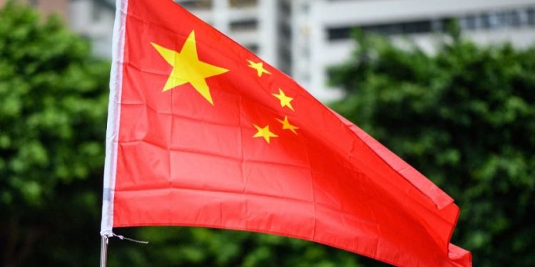 China threatens response to COVID testing requirements for passengers