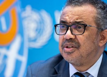 WHO maintains highest alert status for COVID, but sees ‘transition point’