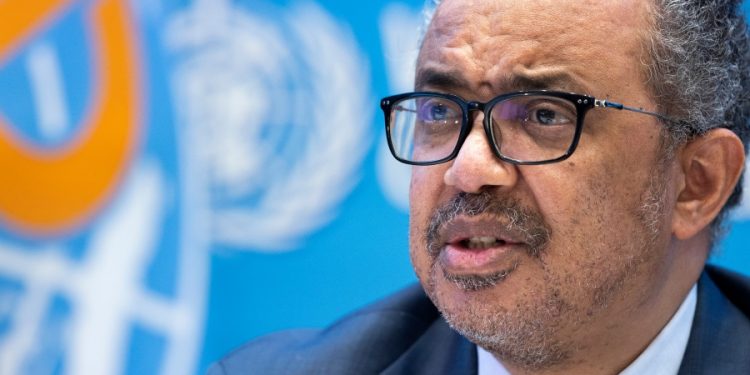 WHO maintains highest alert status for COVID, but sees ‘transition point’