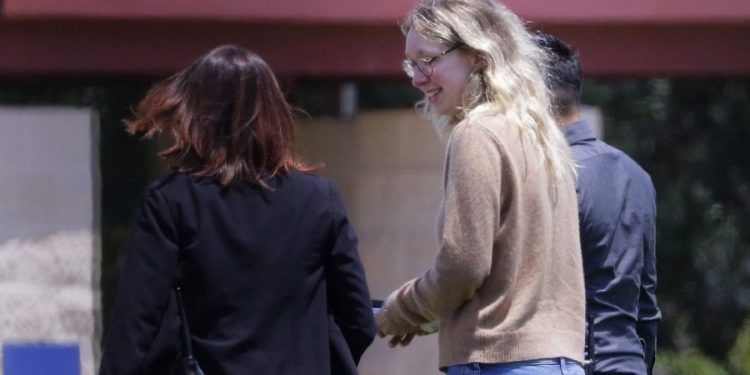 Elizabeth Holmes reports to prison for 11-year sentence for Theranos fraud