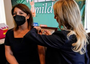 CDC director urges flu, COVID vaccination amid low uptake