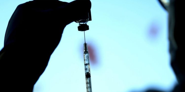 White House faces challenges getting COVID shots to the uninsured