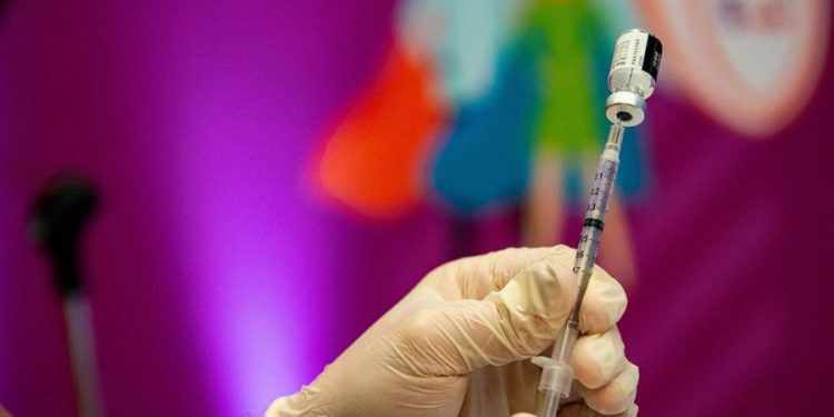 Half of Americans interested in updated COVID vaccine, poll finds