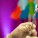 Half of Americans interested in updated COVID vaccine, poll finds