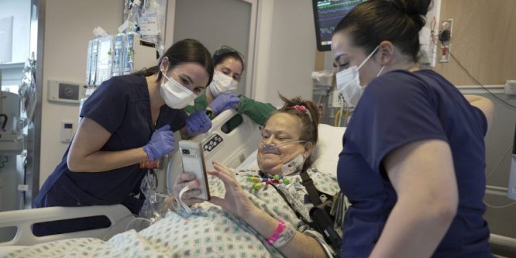 First patient receives combined pig kidney transplant, heart pump