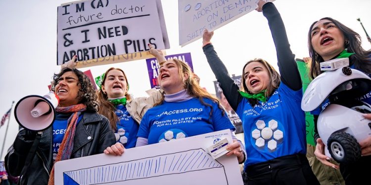 Red state abortion bans headed for clash with blue state shield laws