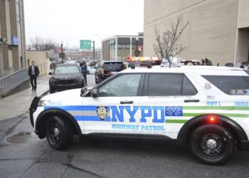 CEO shooting suspect shouts at press outside courthouse 