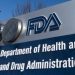 FDA’s top drug regulator sued by drug company, resigns amid conduct probe