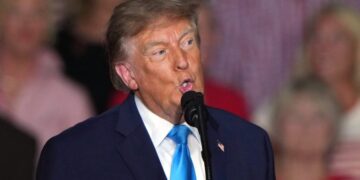 Trump brushes off question about handing out cash before election