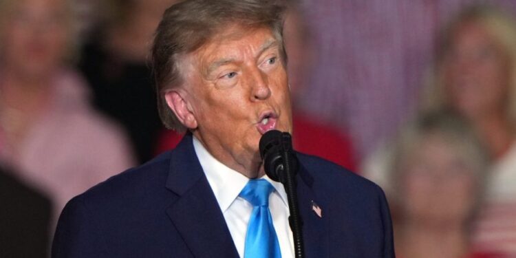 Trump brushes off question about handing out cash before election